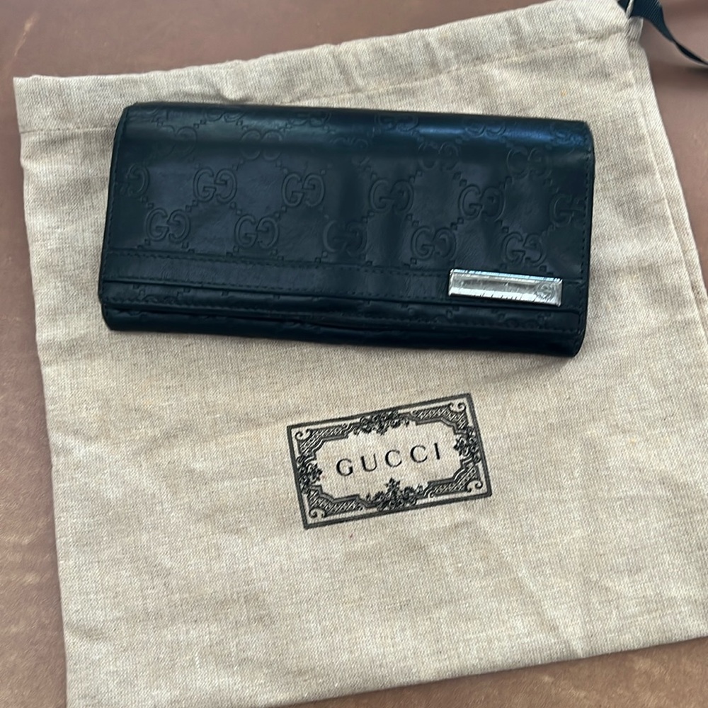Gucci black leather embossed long wallet and dust bag